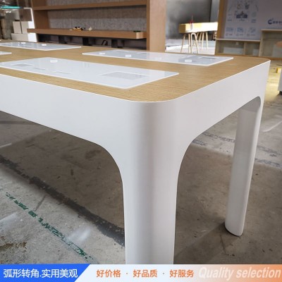 新款苹果手机体验桌电脑配件中岛精品展示柜演示桌烤漆木纹展示柜图2